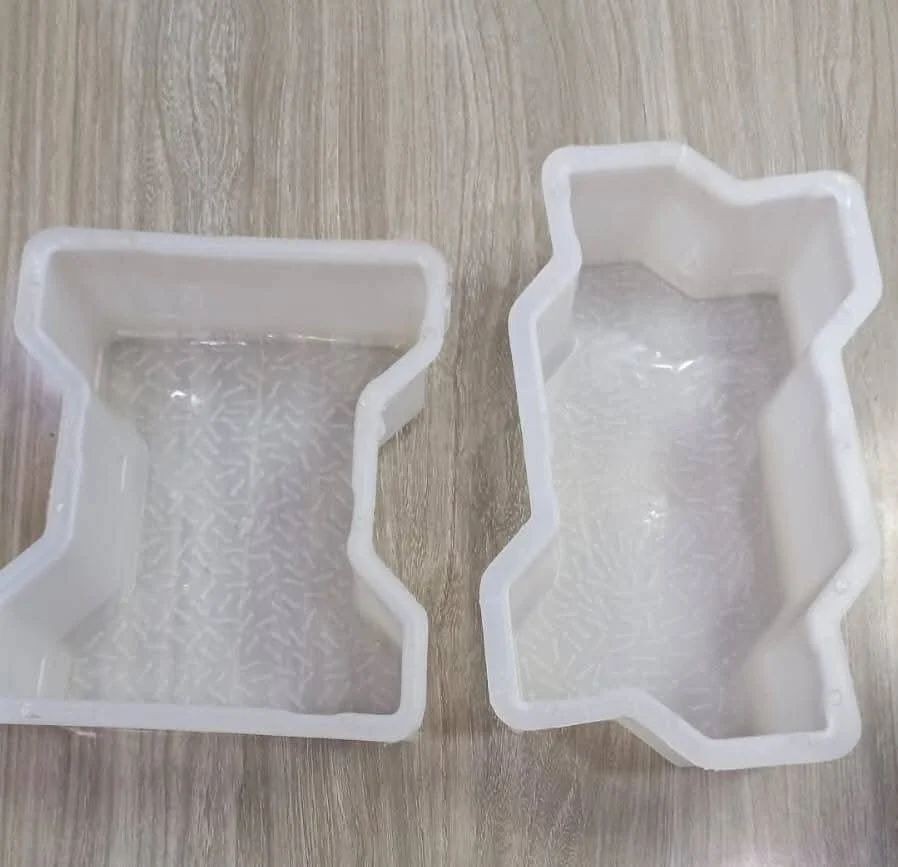 White plastic paver block mould supplied by client